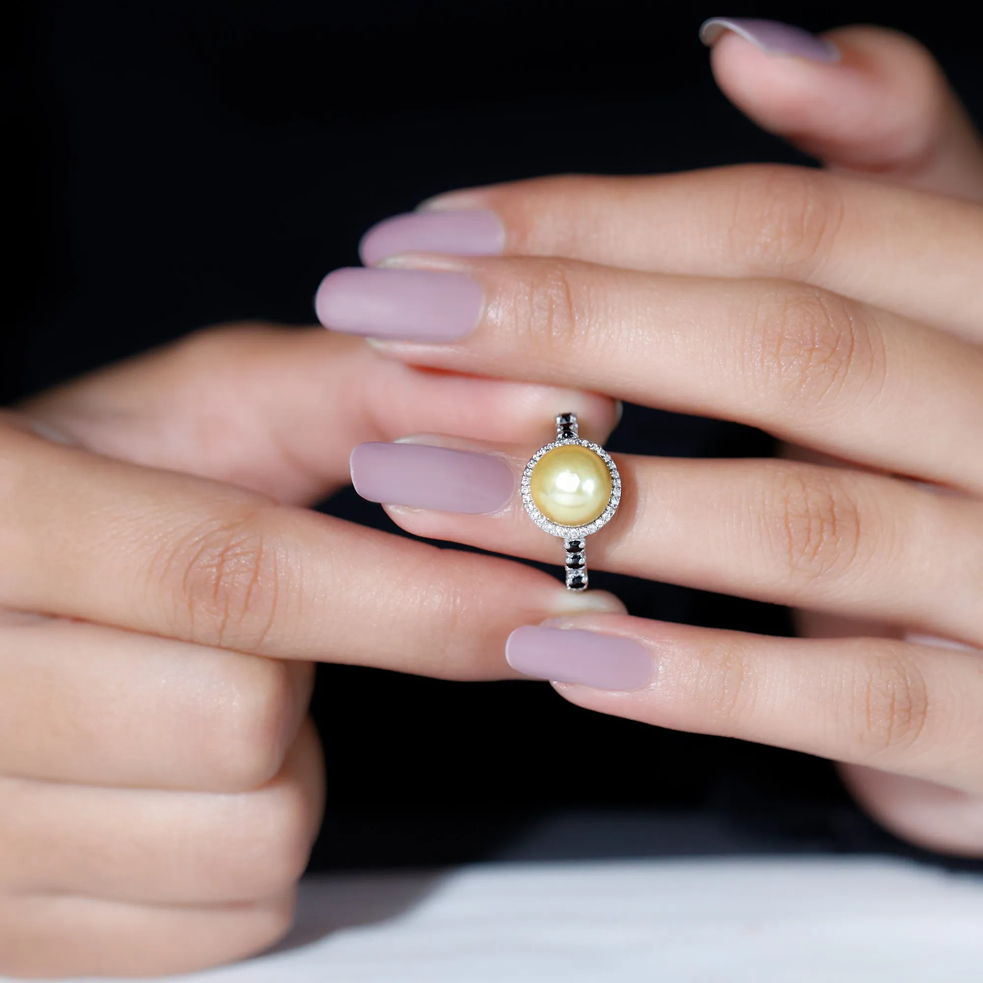 Classic South Sea Pearl Halo Ring with Black and White Diamond Accent