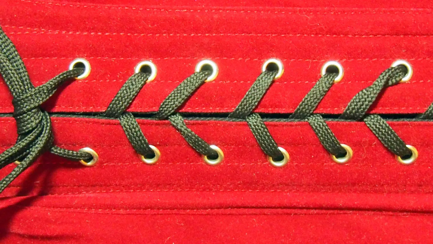 Cute pinup red microfibra (fake suede) custom made corset with bow. Steel-boned overbust corset