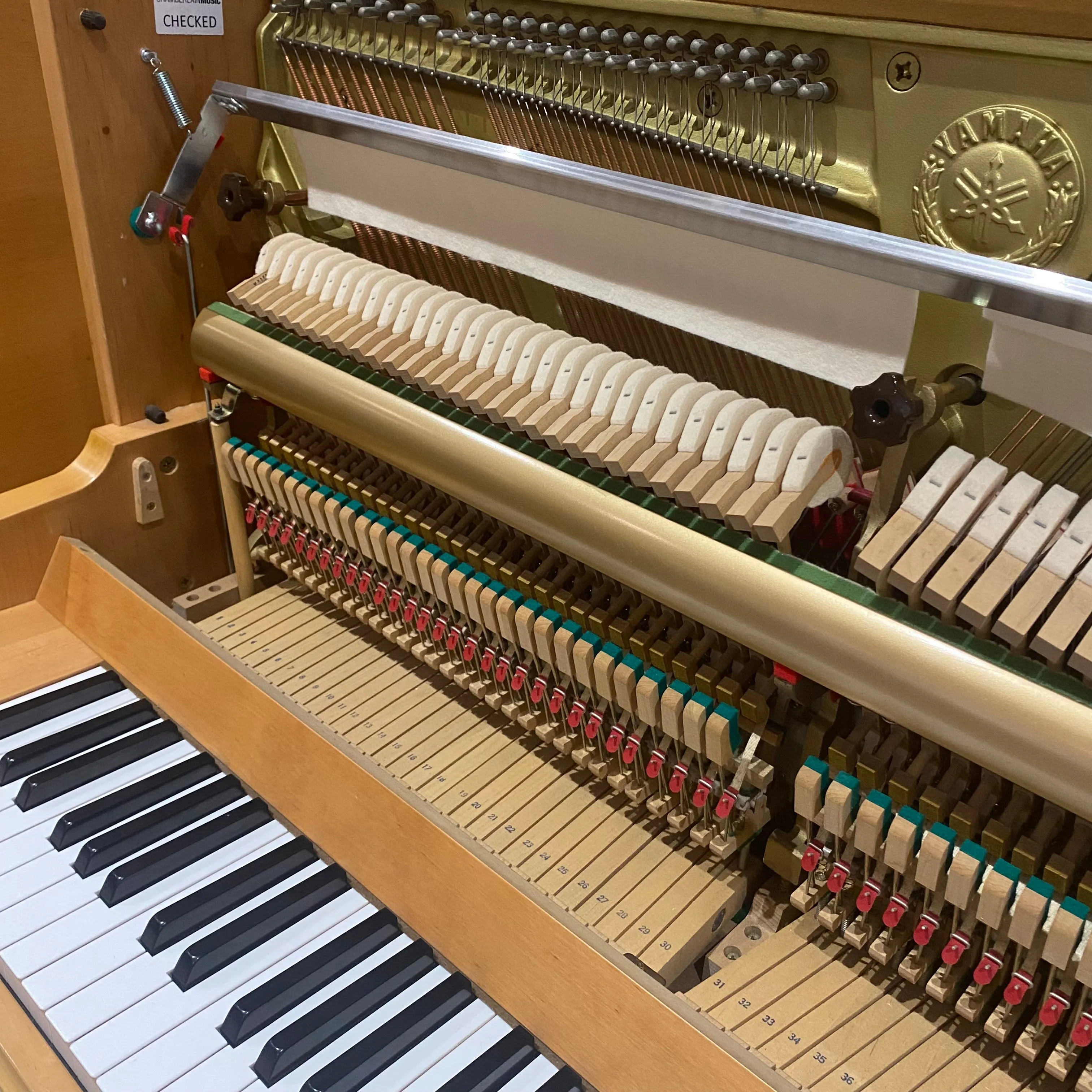 Pre-owned Yamaha P116 upright piano in satin alder