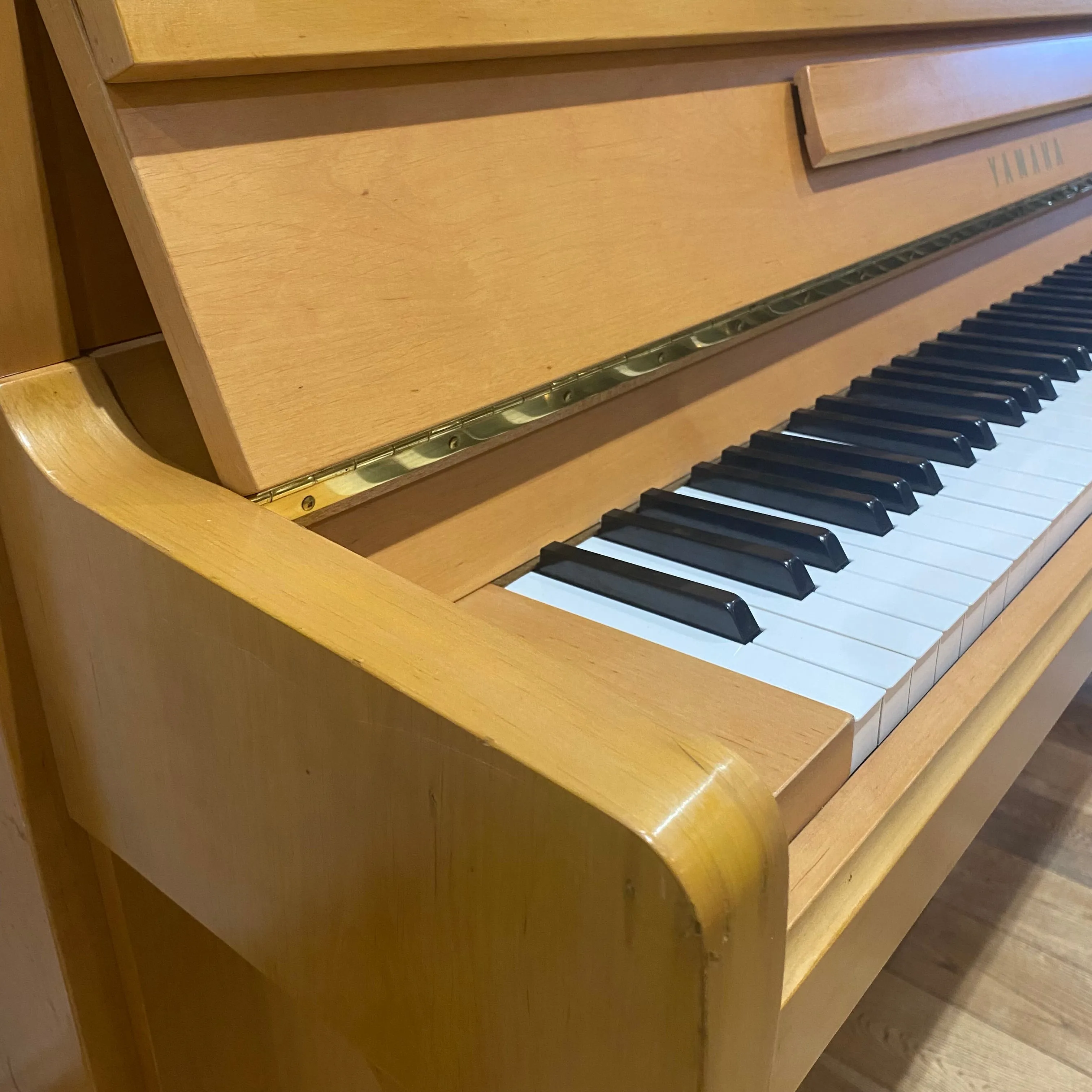 Pre-owned Yamaha P116 upright piano in satin alder