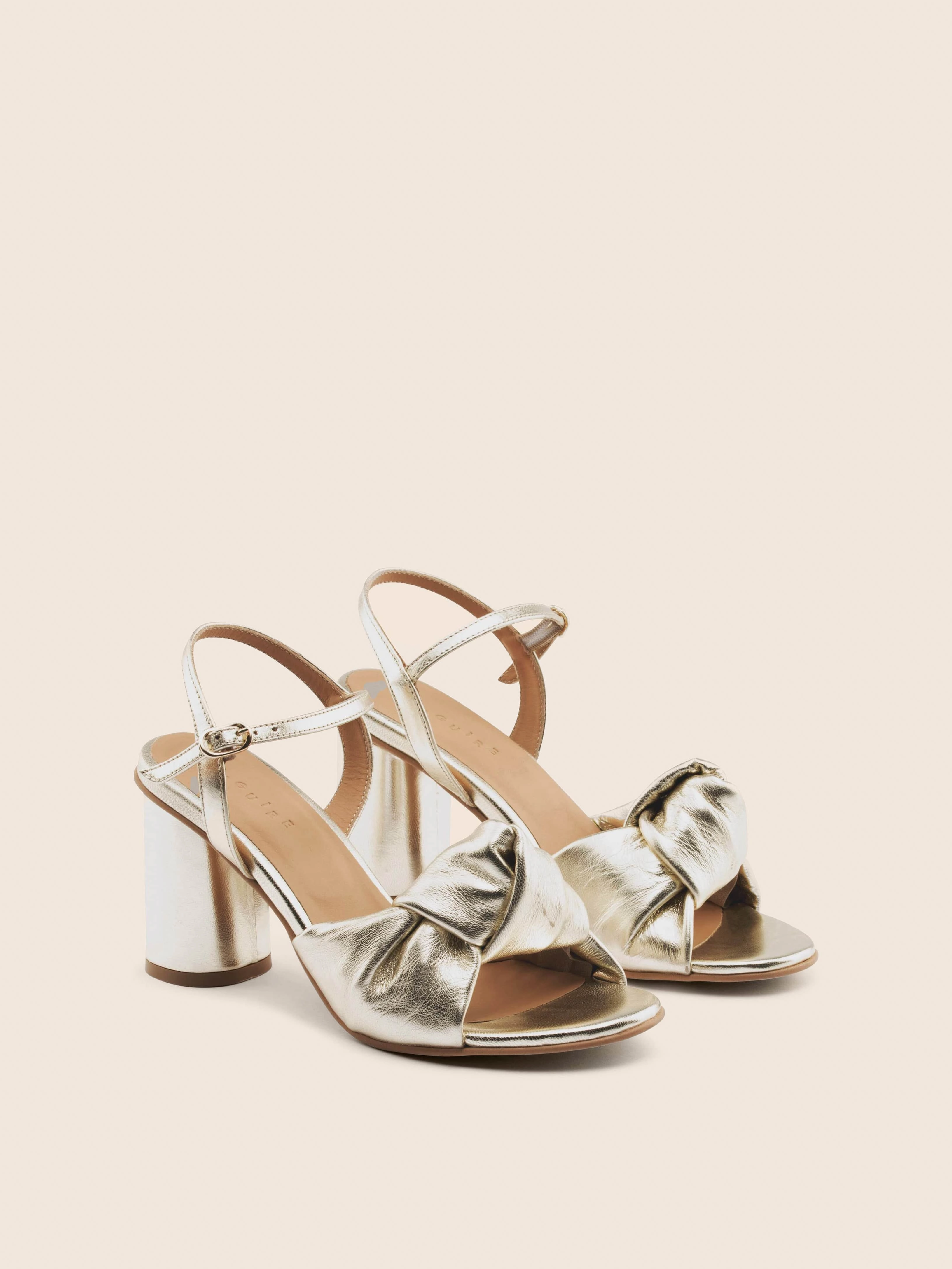 Noto Gold Heel Shape Spark Red Heel