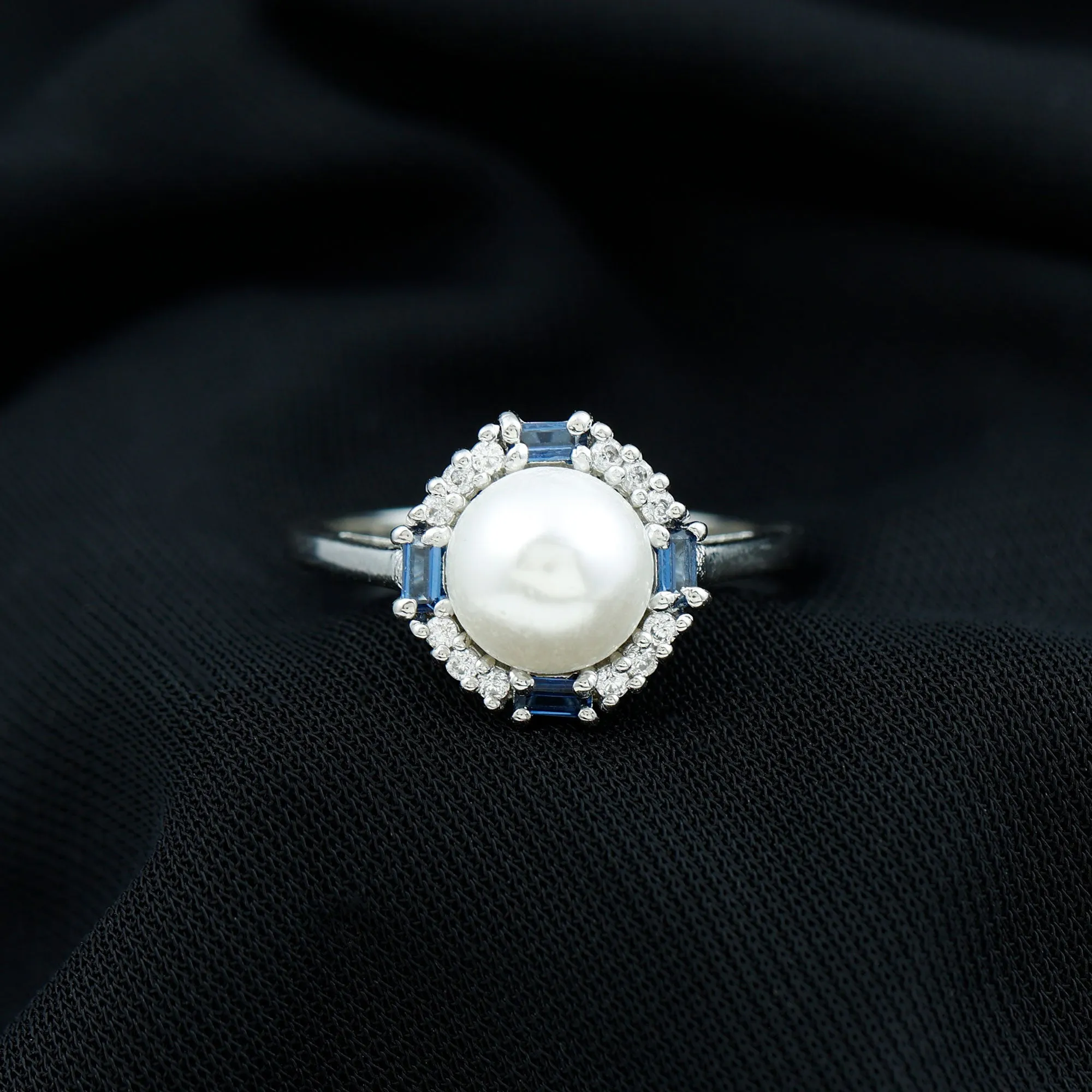 White Freshwater Pearl Halo Ring with Blue Topaz and Diamond